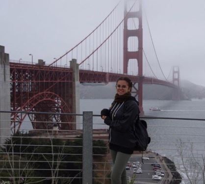 Gaia Giombetti stand in front of the Golden Gate Bridge located in San Francisco, CA.