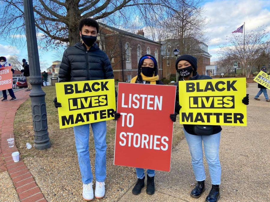 (Left to right) BSU founders Sam Rodman, Olivia Stith, and Samara Brooks are participating at a peaceful protest in Old Town Warrenton.  