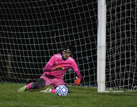 Senior goalie Iker Morales makes a save. He was part of the strong senior core that led the team all season. Photo courtesy of the yearbook staff.   