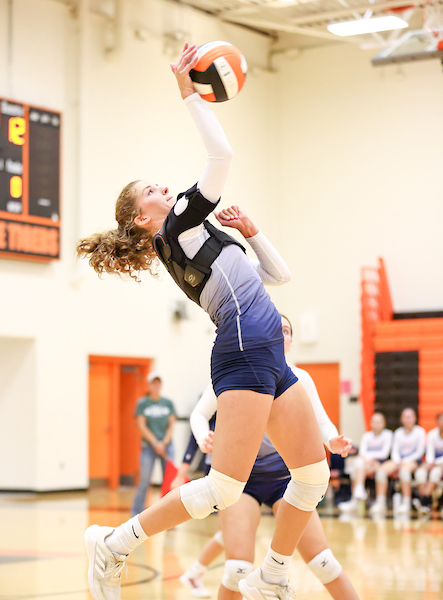 Senior Kendall Turner is hits the ball in a match against Brentsville. Photo courtesy of the yearbook staff. 